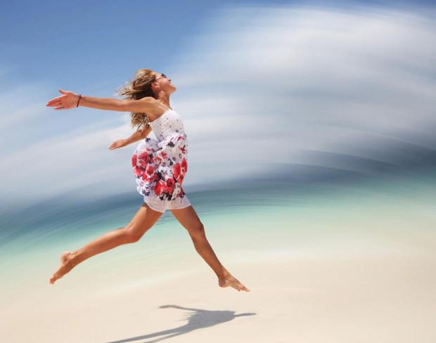 Girl jumping on beach nice